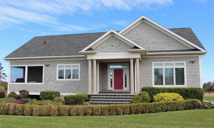 French Village House | Vacation Home Located Steps from North Shore Beach, 10 Minutes Away From Golf
