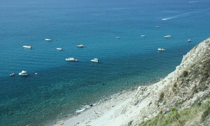 Province of Messina House | Vacation Home "Oasi Azzurra - Bilocale Standard-102" with Shared Pool & 2 Shared Terraces