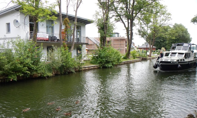 Storkow Apartment | Vacation home Seebrise Modern apartments on the lake, rowing boat included subject to availability