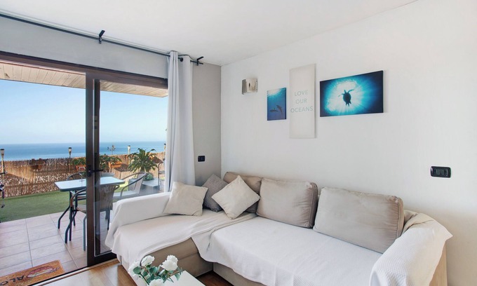 Puerto Rico Apartment | Vacation Home "Sunset" with Sea View, Shared Pool & Wi-Fi