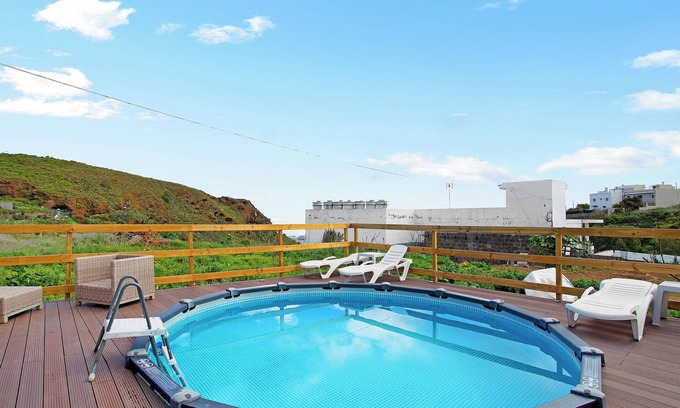 Moya Apartment | Vacation 'Montemar 1' with Sea View, Shared Pool and Wi-Fi