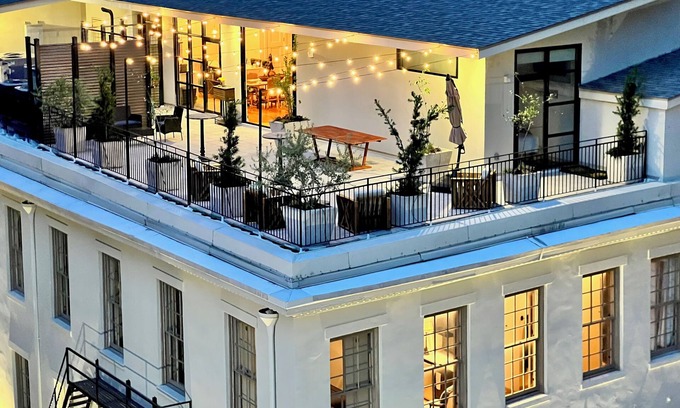 Central Business District Hotel | Vacation rental w/Party Rooftop-Block to Parades, Events and Pet-Friendly!