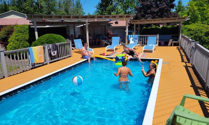 Sterling House | Vacation Rental with pool and access to Bay with dock and launching abilities.