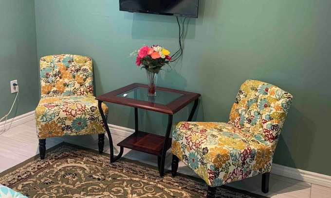 Levittown House | Very peaceful bedroom with separate bathroom and entrance