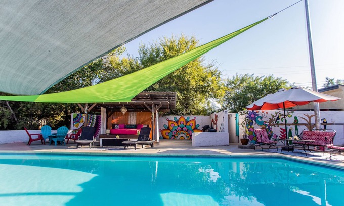 Lakeside Apartment | Vibrant Bohemian Loft Apartment with Shared Pool, Garden & Colorful Murals