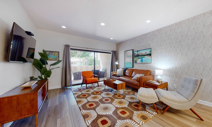 Palm Springs Apartment | Vibrant dog-friendly condo with hot tub, tennis court, pool, W/D, grill & patio