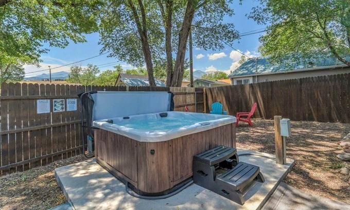 Colorado Springs House | Vibrant Watermelon! Hot Tub & King Bed & BBQ!