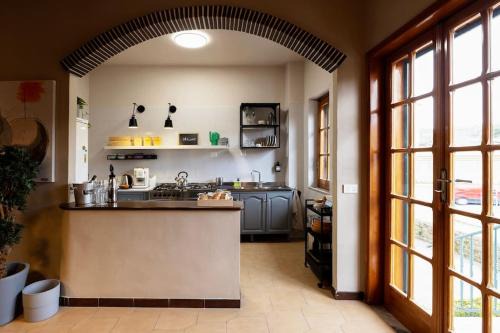 Garzano Apartment | Vicolo Zenone 8 Casa Esclusiva tra Natura e Arte
