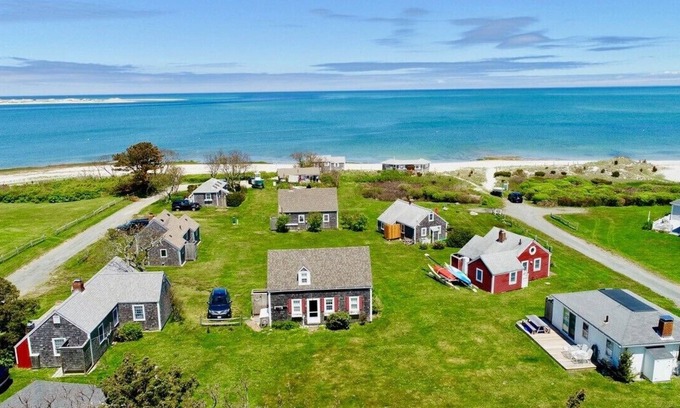 Barnstable Cottage | Views across Barnstable Harbor from the deck of this 2 br cottage with access to Association beach.