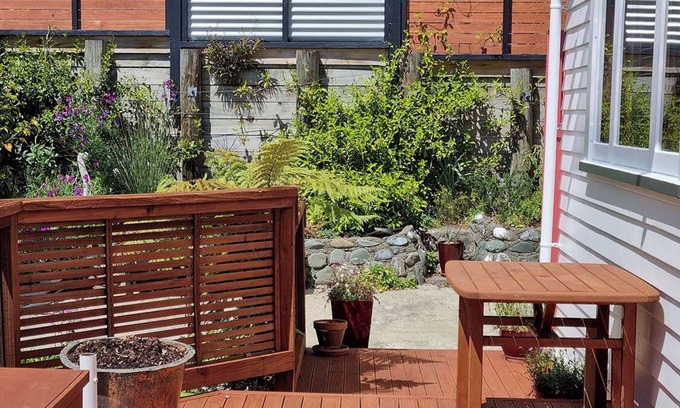 Nelson South House | Views, art, comfort, charming house in Nelson. Deck, beautiful garden and lounge
