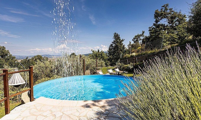 Chianni Apartment | Villa Belfiore: A characteristic and welcoming apartment that covers the entire top floor of a villa surrounded by meadows and by green hills, with Free WI-FI.