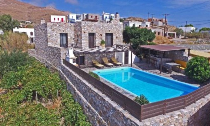 Megas Gialos Villa | Villa Camellia is a beautiful stone house overlooking the sea.