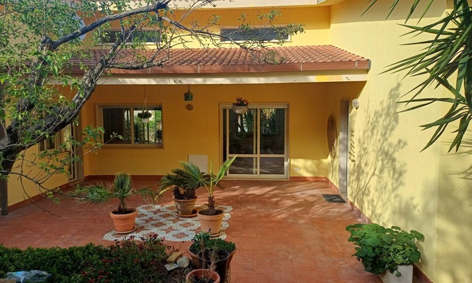 Brancaleone Marina Villa | Villa entirely surrounded by garden a stone's throw from the sea.
