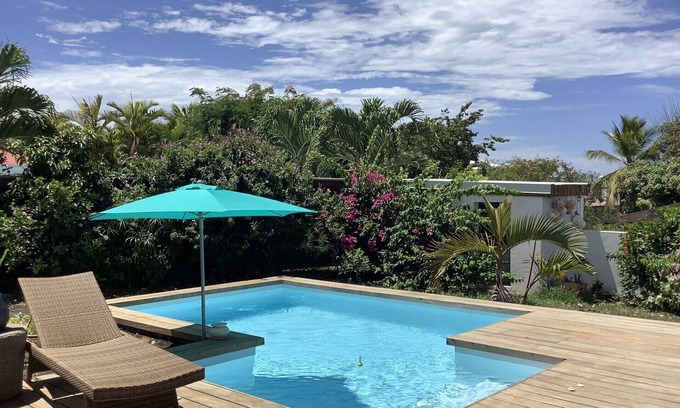 Grande-Terre Villa | villa facing the sea, large terrace, garden ..