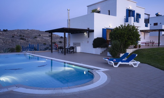 Pefkos Villa | Villa for six. Large pool, sea views, lawned gardens. Near beach and amenities.