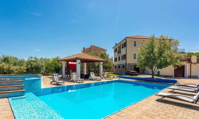 Sveti Vid Dobrinjski Villa | Villa for large groups with 60m2 heated pool, Jacuzzi, sauna, fitness, playground and wine cellar