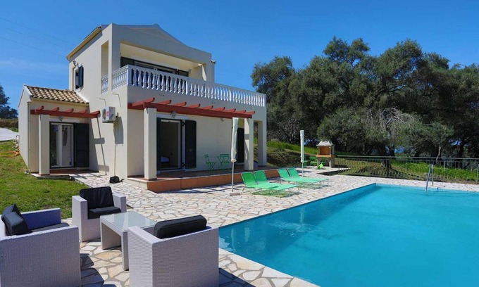 Astrakeri House | Villa Iremia is hidden in a lovely peaceful olive grove which provides it with total privacy.
