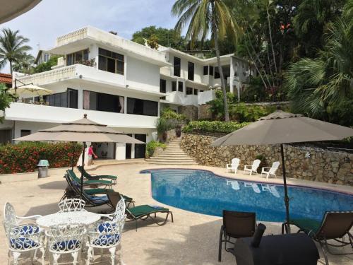 Las Playas Villa | Villa Palmitas acogedor departamento nivel piscina gigante jardines