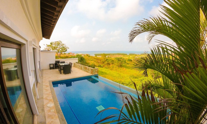 Pristine Bay Villa | Villa Paradiso Sorrunded by Pete Dye Golf Course