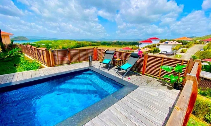 Les Jalna Villa | Villa Passion Cannelle de standing avec sa piscine vue mer