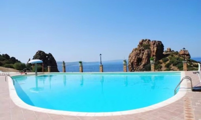 Nebida Villa | Villa Red Coral: sleeps 4, shared swimming pool, parking, IT111035C2000P7143.
