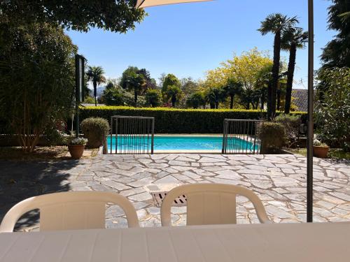 Lesa Apartment | Villa Santa Chiara Lesa - appartamento vista lago con piscina