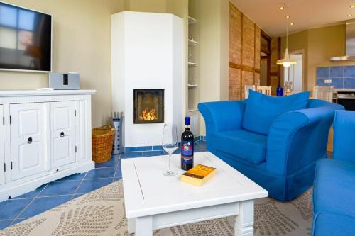 Sellin Villa | Villa "To Hus" in Sellin - Appartement 04 mit Kamin und Südbalkon