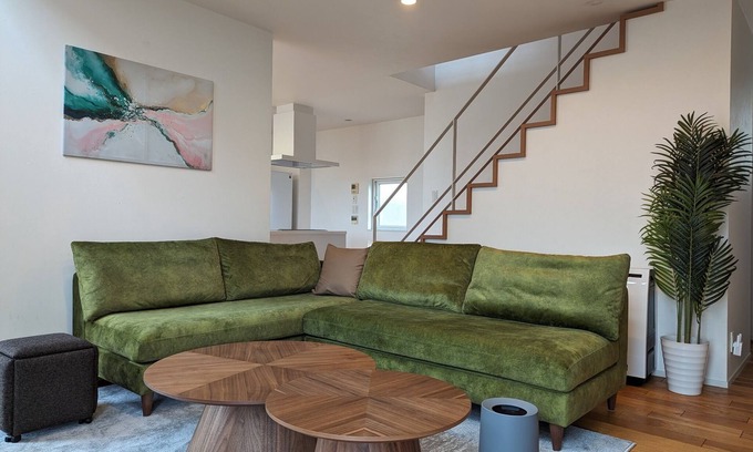 Naganuma House | Villa with glass atrium living room/Yubari-gun Hokkaidō