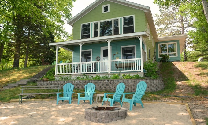 Traverse City House | Vintage Artsy Lake Cottage with Island Views