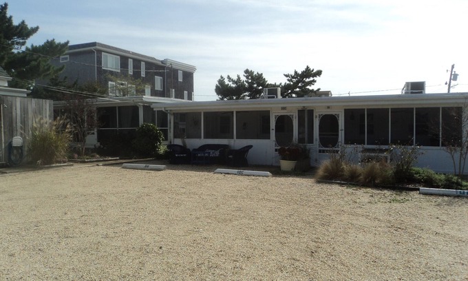 Rehoboth by the Sea Cottage | Vintage Dog-friendly Dewey Beach Cottage - 125 steps to the beach!
