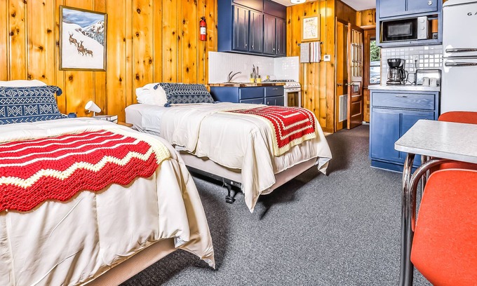 Presque Isle House | Vintage waterfront suite on South Turtle Lake with on-site dock & rowboats