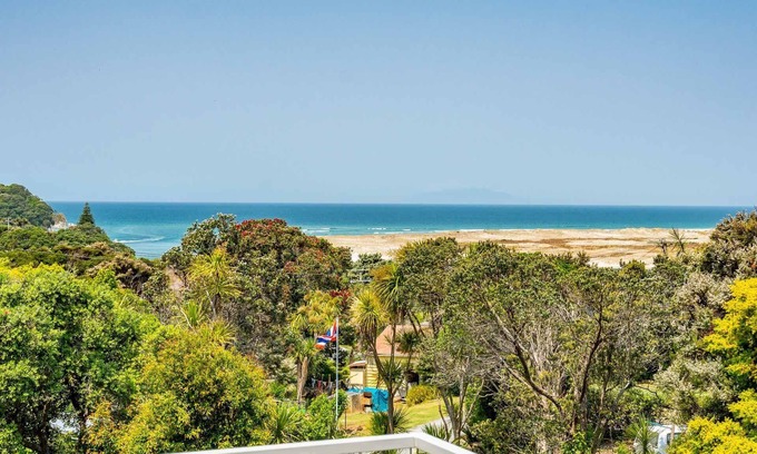 Mangawhai Heads House | Vitamin Sea - Quirky holiday home in bush setting with views, walk to the estuary and surf beach