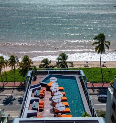 Cabo Branco Apartment | Viva hospedagens - Flat 009 beira mar com Varanda e piscina aquecida