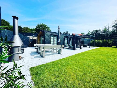 Traisen House | Voralpen Lodge - Ferienhaus mit Gym & Wellnessbereich