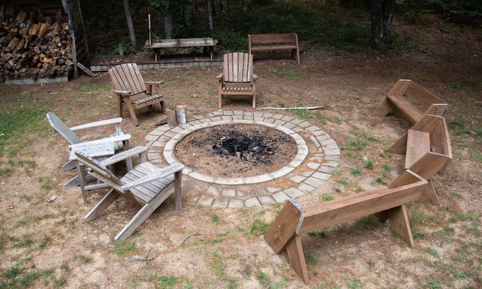 Munising House | Walk out lower level with 3 beds and full private bath and fireplace.