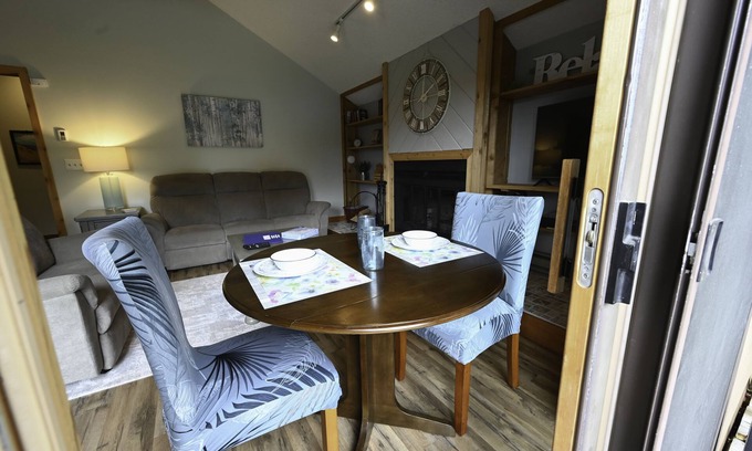Mancelona Condo | Walk to golf course and pool. fireplace. Sleeps 2 adults. Boat Parking