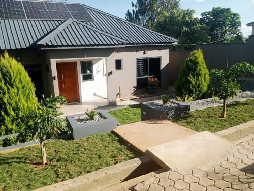 Mpemba Apartment | Warm Care Executive Apartments