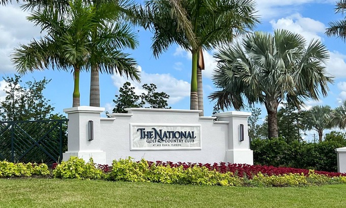 Ave Maria House | Warm weather year round in brand new coach home with optional golf