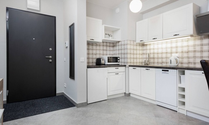 Powazki Apartment | Warsaw Apartment Obozowa by Renters