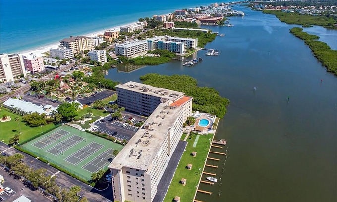 Indian Shores Condo | Watch the Boats Go By and Dolphins Play!