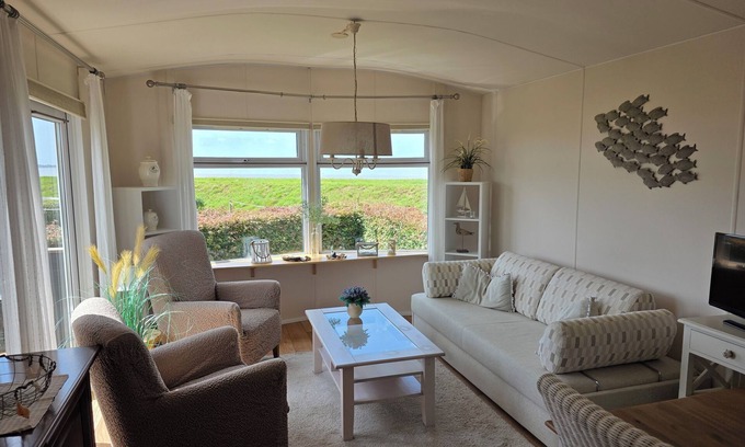 Westerland Ski Chalet | Watch the sun sink into the sea from your living room at Chalet WadRust