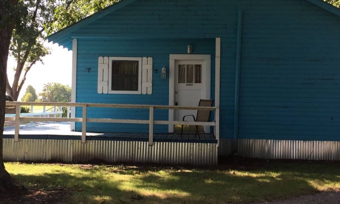 Lake Village House | Watch the sunrise with your family on Lake Chicot!