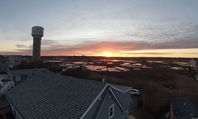 Salisbury Beach Apartment | Watch the Sunrise with coffee