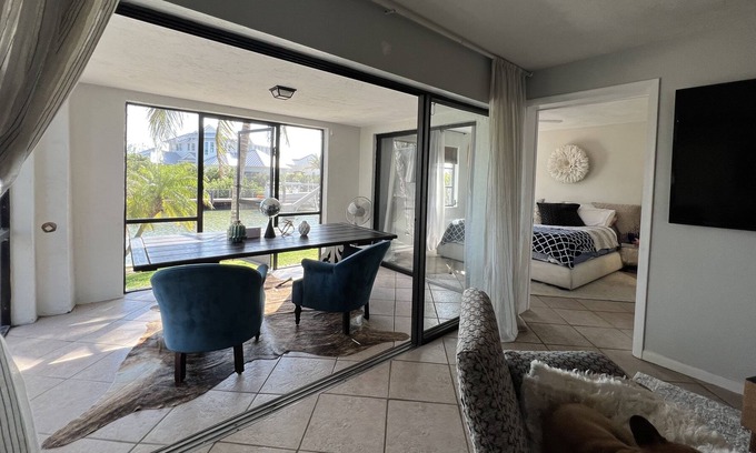 Royal Harbor Apartment | Watch the yachts roll on by, looking at the beautiful sunset sky