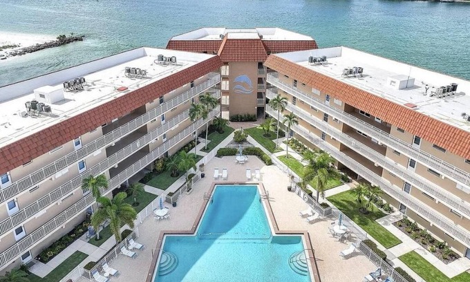 Isles of Capri Condo | WATERFONT Direct Gulf Access with Boat Slip and Covered Parking Spot