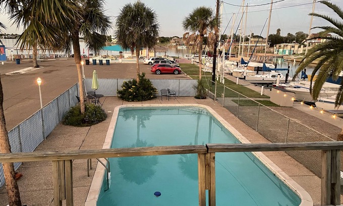 Ingleside on the Bay Condo | Waterfront 2 bedroom condo with pool, boat ramp and slips