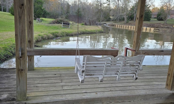West Livingston House | Waterfront 4-bedroom estate with Indoor Pool and covered fishing dock Fire Pit
