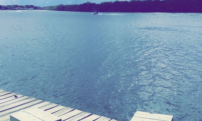 Rio Hondo House | Waterfront 4 bedroom cabin with a great location for fishing in its backyard.