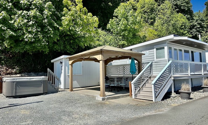 Camano Island Cottage | Waterfront Cabin on Camano Island with hot tub and outdoor patio.