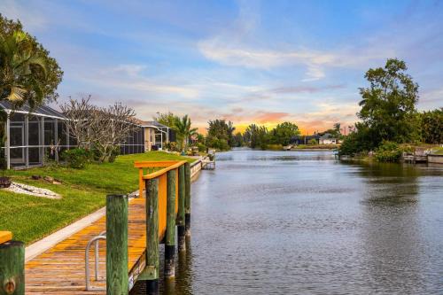 Pelican House | Waterfront Canal Home with HTD Pool Spa and Kayaks
